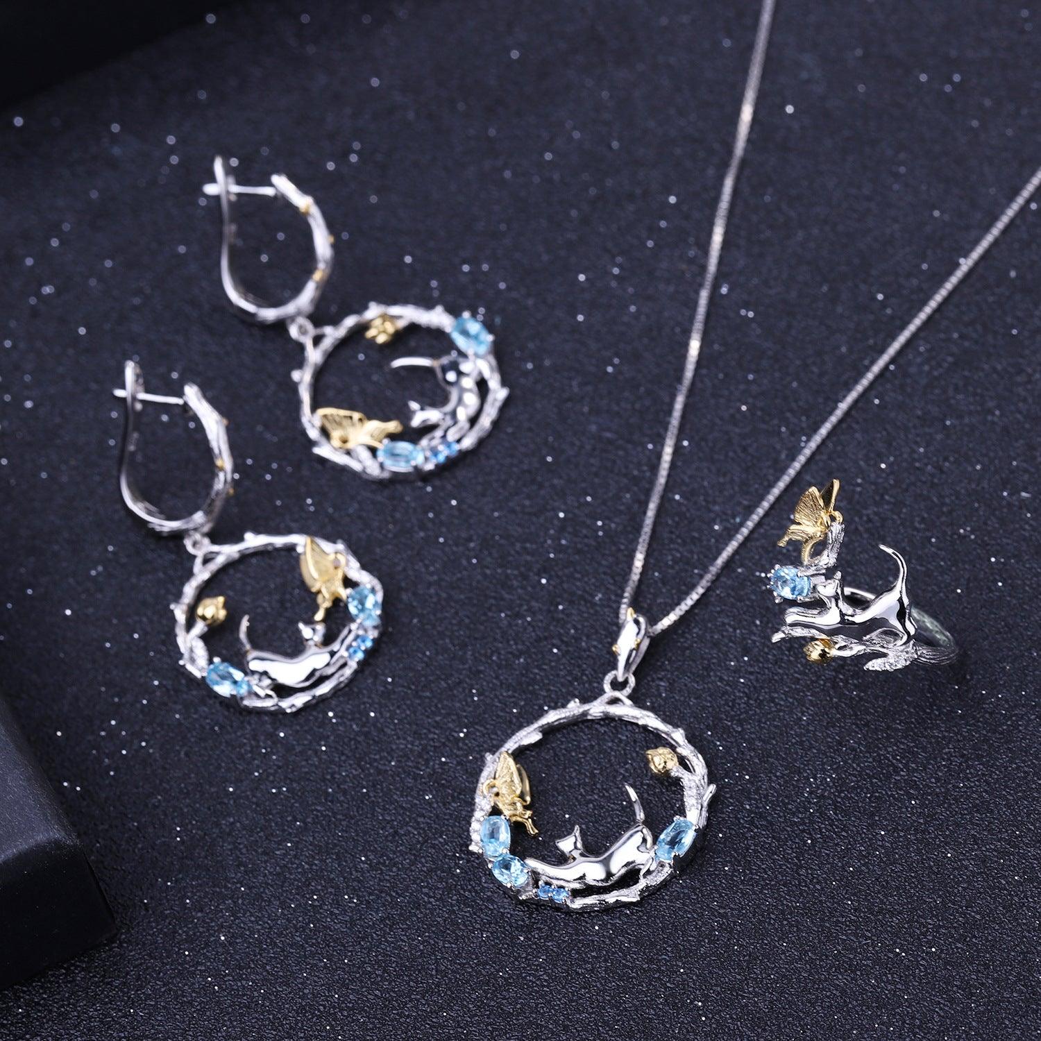 Cat under the Butterfly S925 Sterling Silver natural topaz necklace